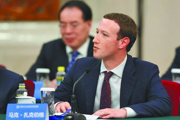 臉書公司創始人祖克伯,年僅33歲。(中新社資料照片)