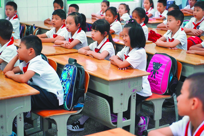 廣東省擬賦予中小學校懲戒權,讓教師有權對學生「罰站罰跑」。(新華社)