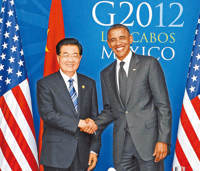2012年,大陸國家主席胡錦濤(左)在墨西哥G20峰會會見美國總統歐巴馬。(新華社)