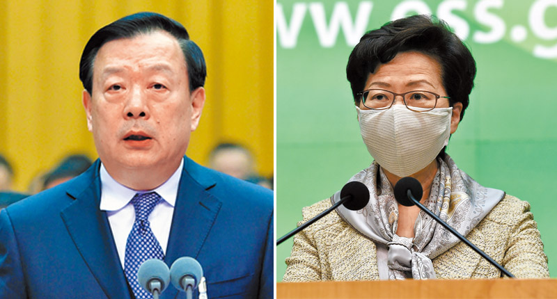 ▲5月19日上午,香港特首林鄭月娥(右)出席行政會議前會見傳媒。左為港澳事務辦公室主任夏寶龍資料照片。(中新社)